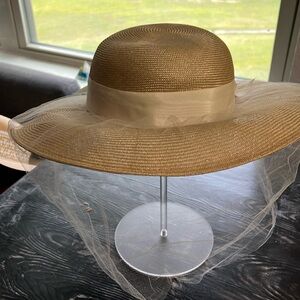 Beige hat with cream bow